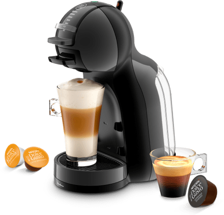 Dolce Gusto machine with coffee cup and coffee pods around